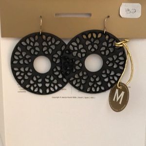 Statement earrings made from rubber.